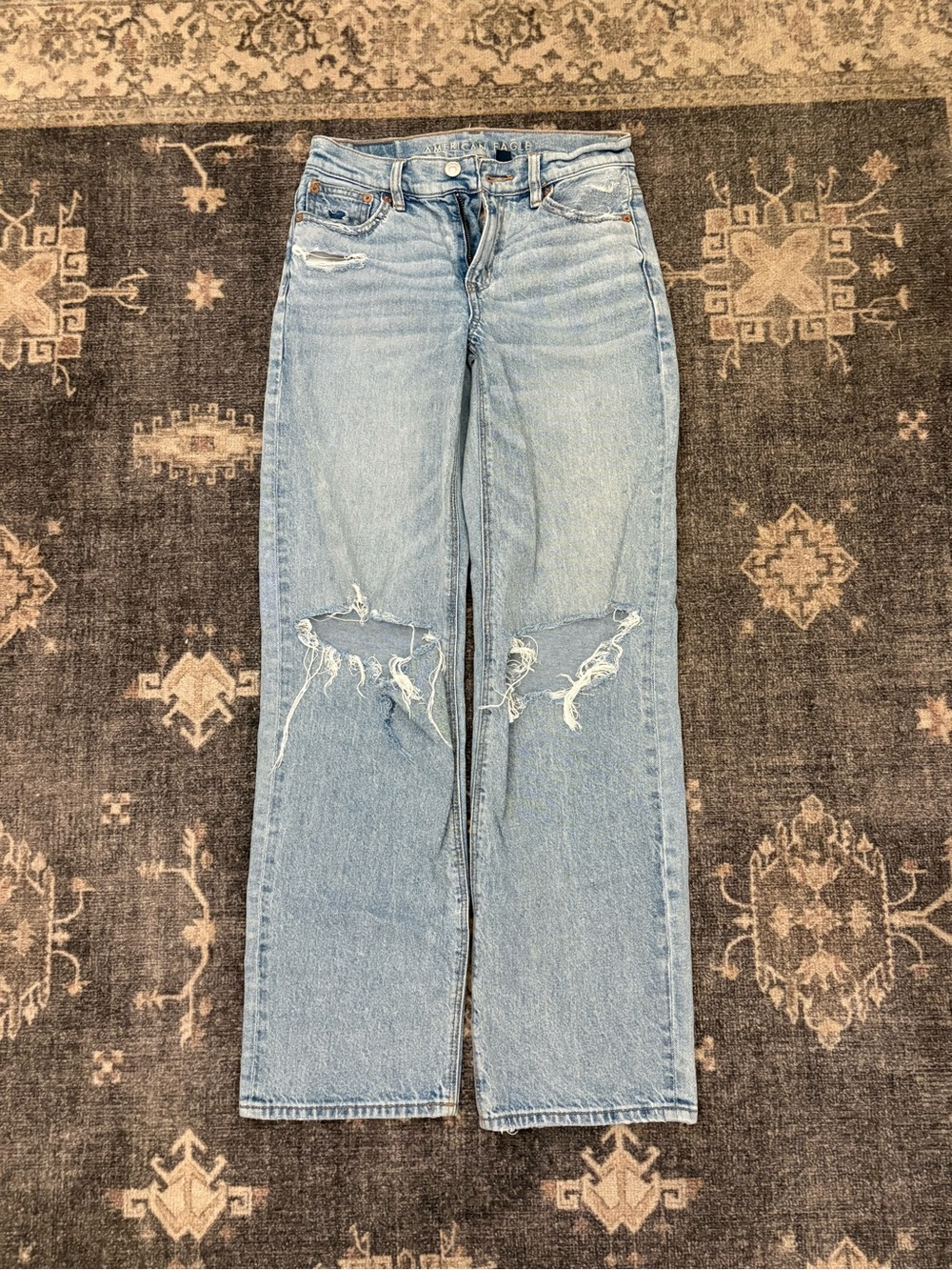 Light Blue Distressed Strigid Jeans